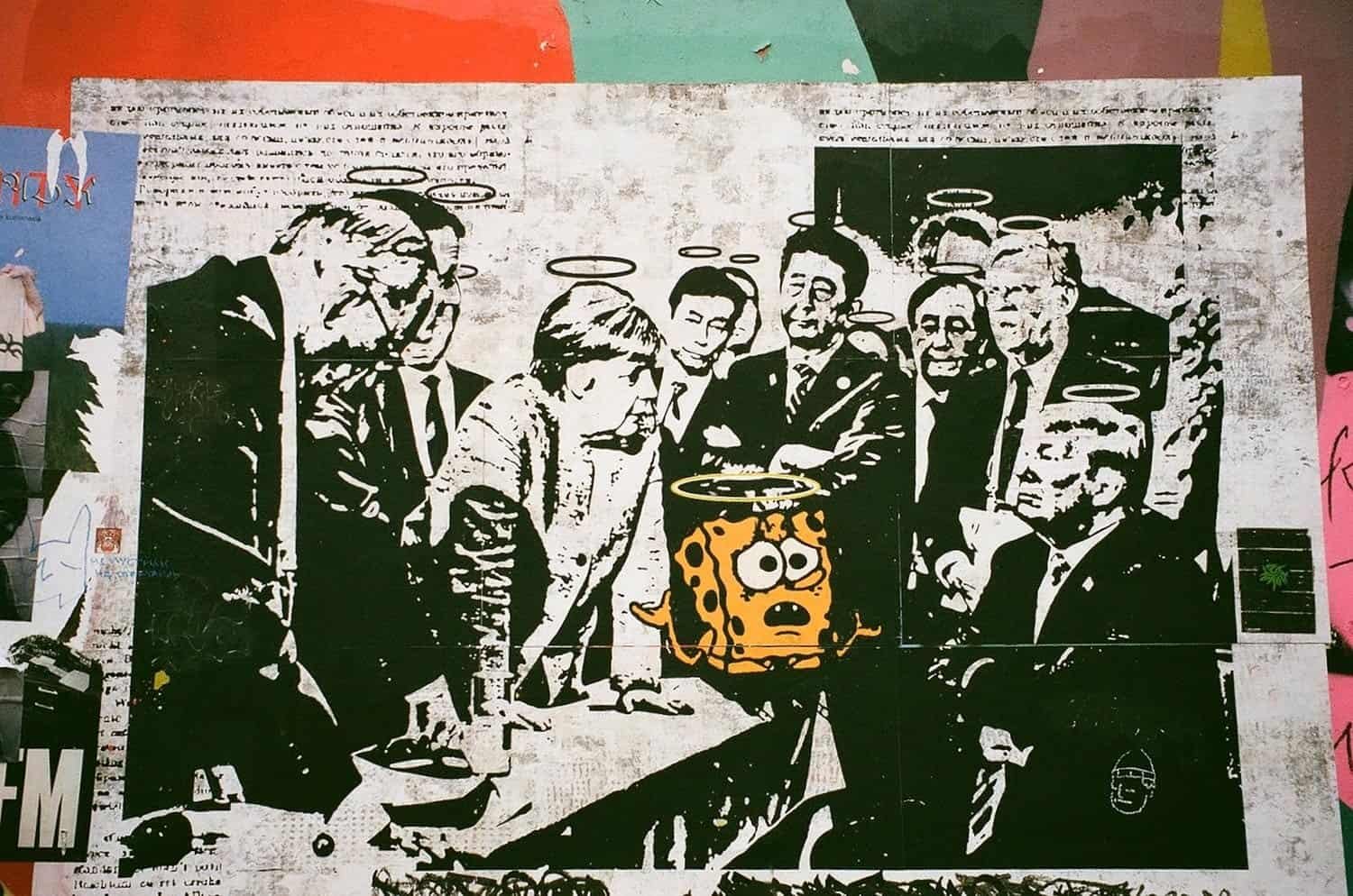 Spongebob Squarepants with halo and shocked expression surrounded by a group of people with halos, in street art style.